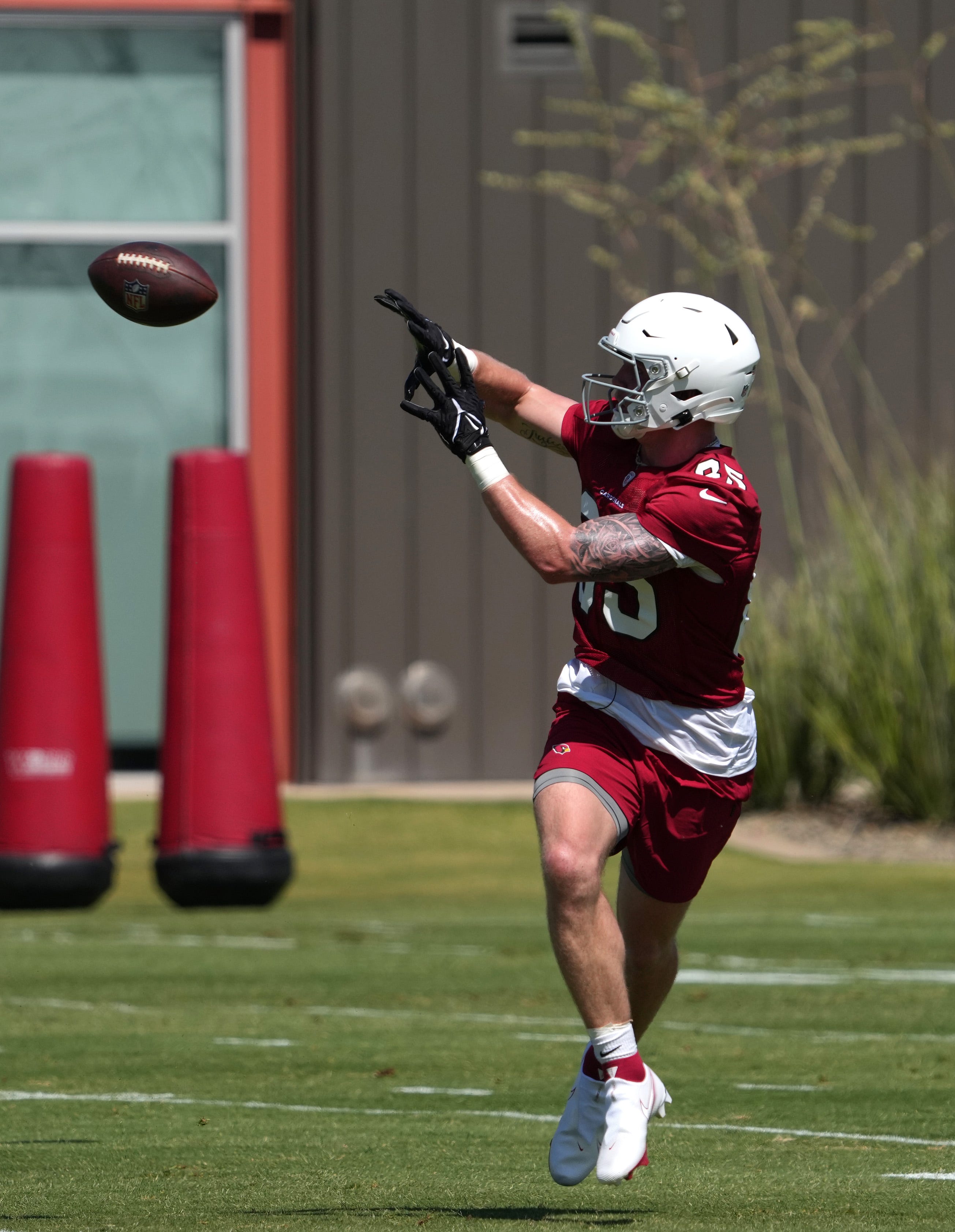 Arizona Cardinals tight end Trey McBride performs a drill during rookie minicamp on May 13.
