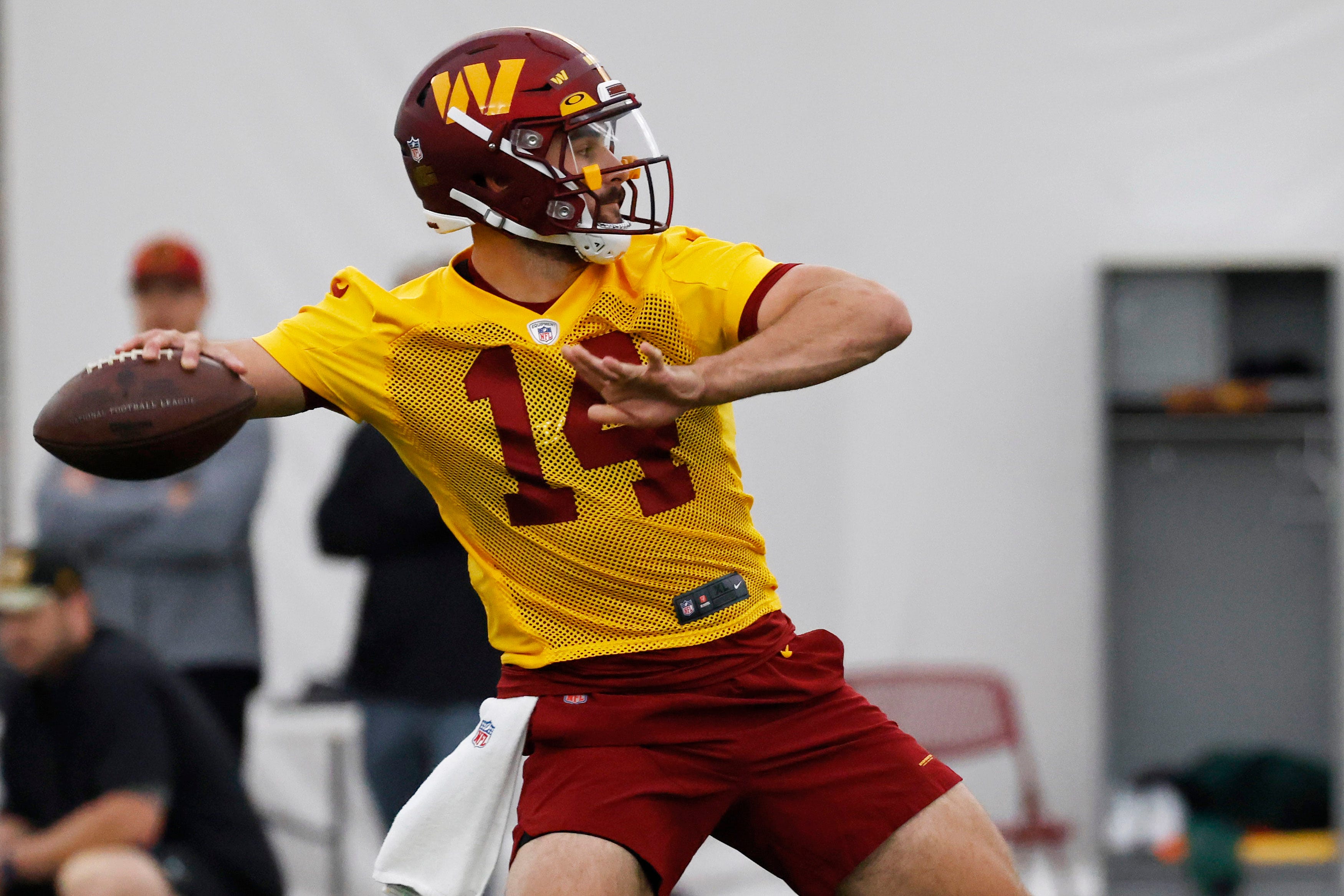 Washington Commanders quarterback Sam Howell passes the ball during rookie minicamp at Inova Performance Center In Ashburn, Virginia, on May 6.