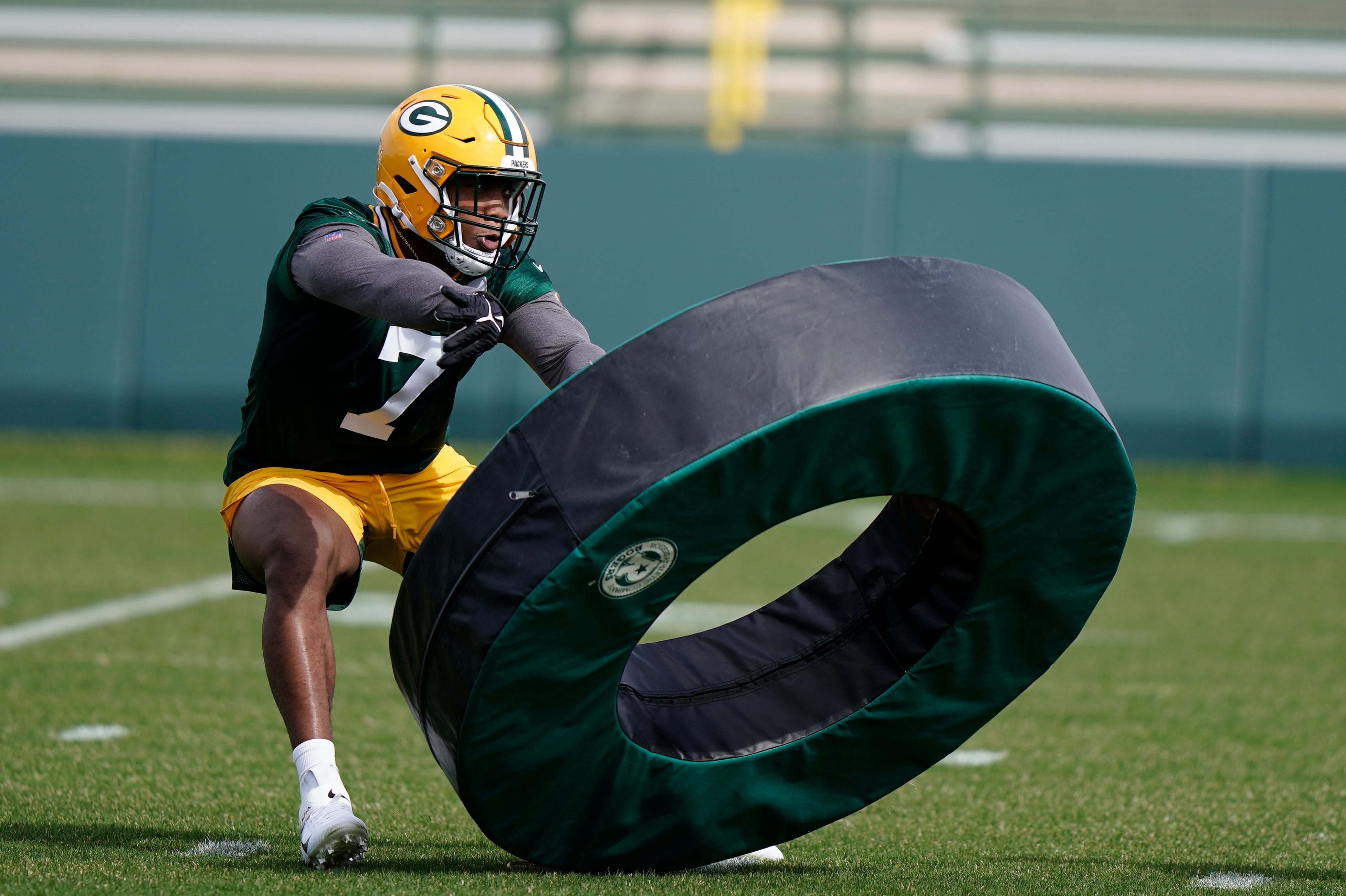 Green Bay Packers linebacker Quay Walker runs a drill during  rookie minicamp on May 6.