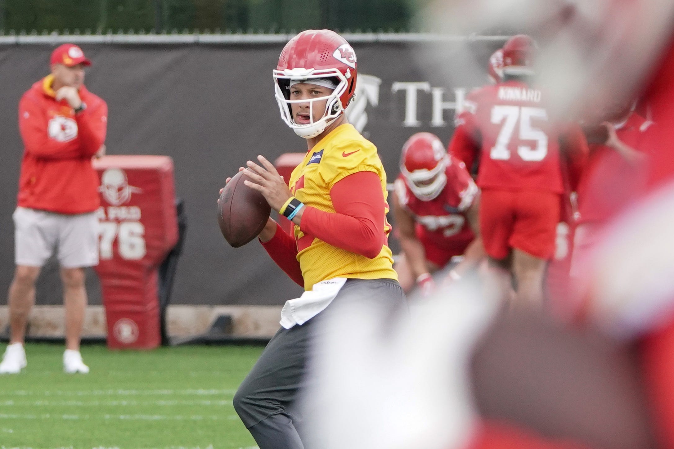 Kansas City Chiefs quarterback Patrick Mahomes drops back to pass during organized team activities at The University of Kansas Health System Training Complex on May 26.
